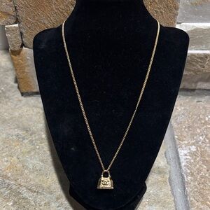Elegant Gold CC Purse Pendant Necklace